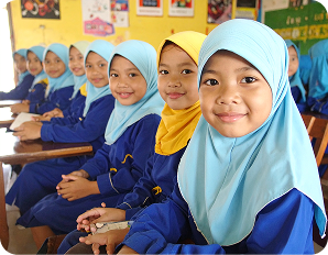 Firefly_Close-up front view of a group of Indonesian kindergarten girls sitting neatly in a c 978213